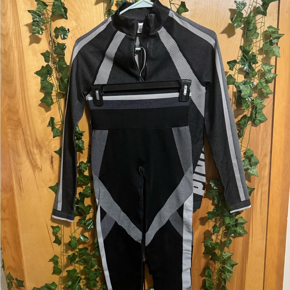 Never worn. Victoria Secrets workout outfit! Jacket and leggings.